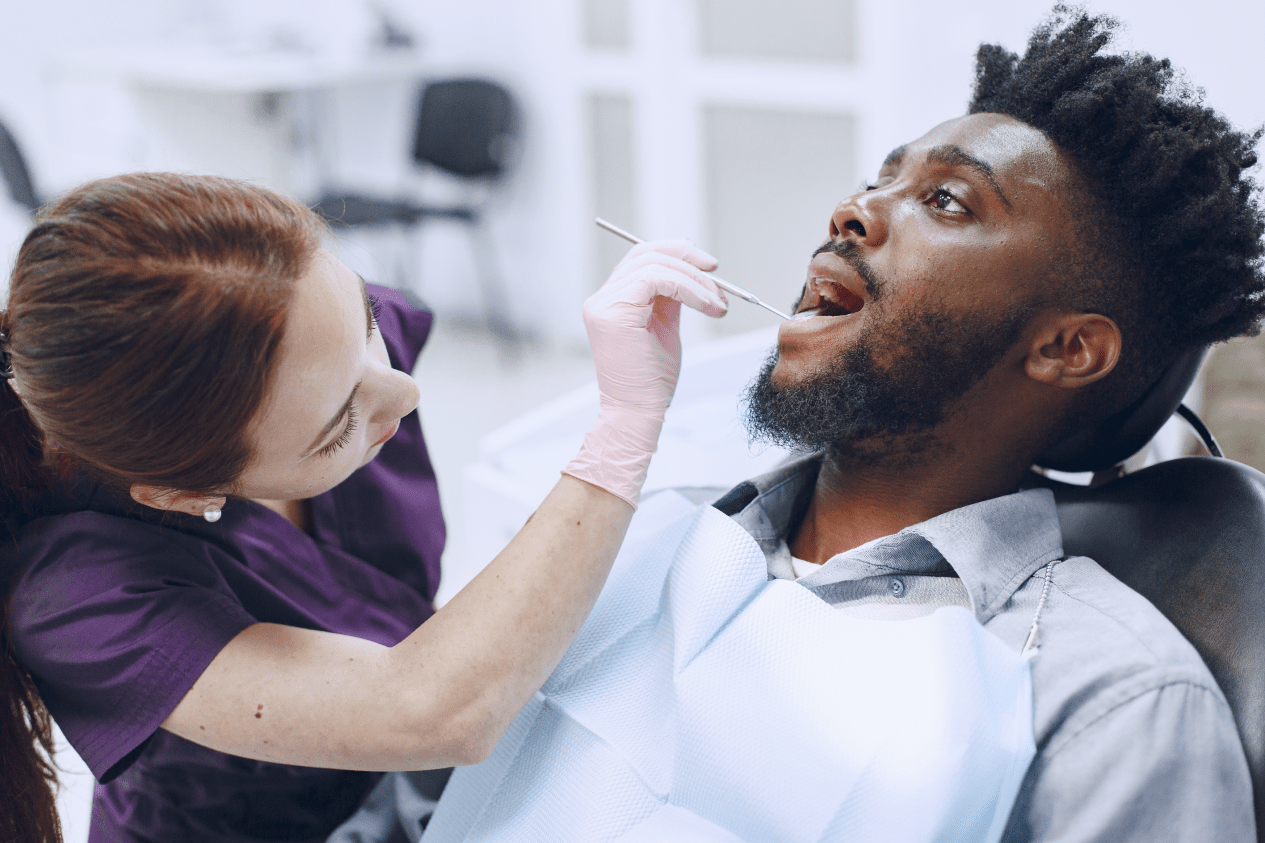 young man getting teeth checked