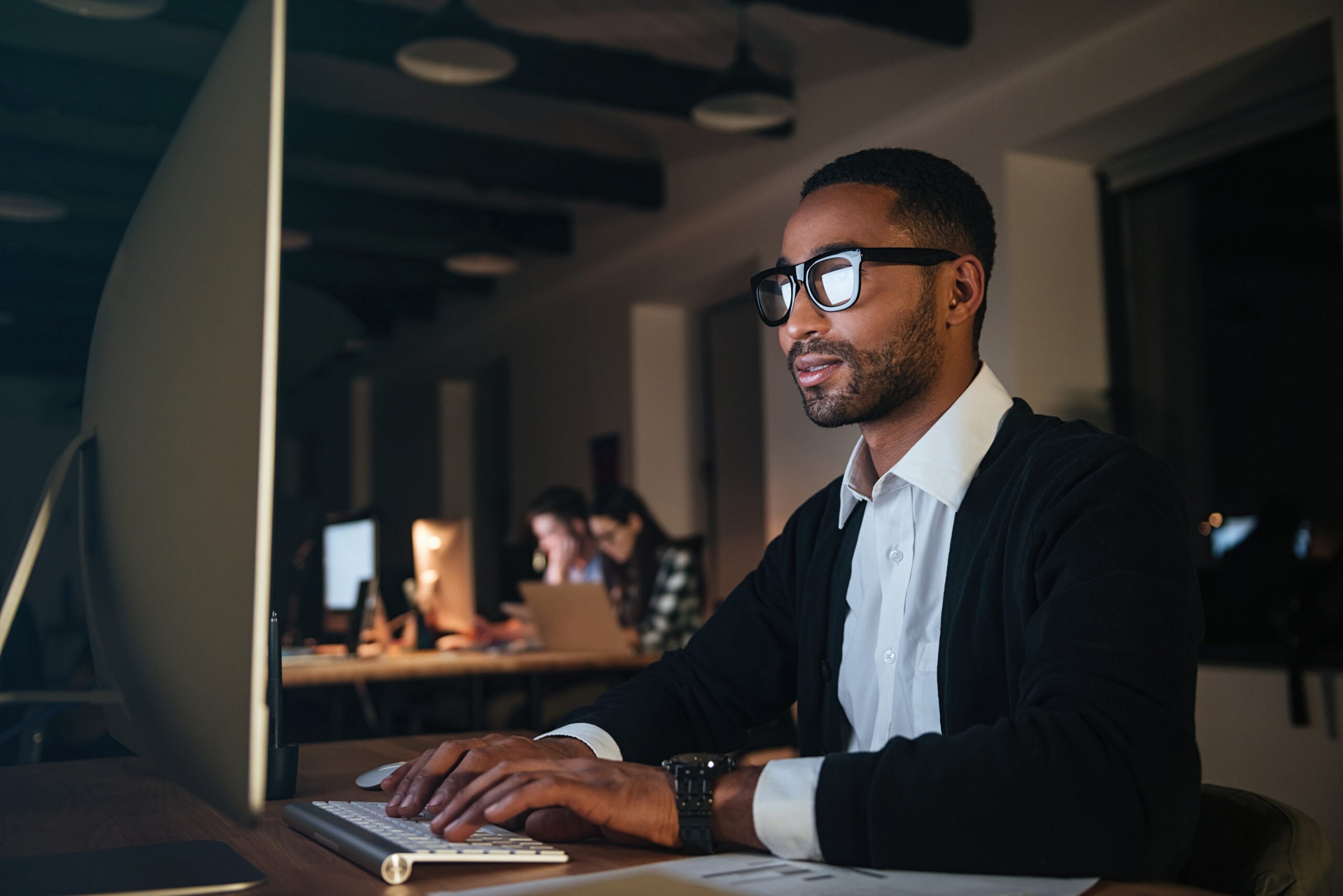 man focused on the computer screen